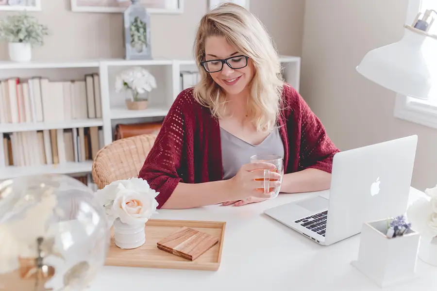 Pretty Blonde Working from Home | Shopify Stores & Beautiful Websites for Your Business | Lycona Media | Based in South Africa